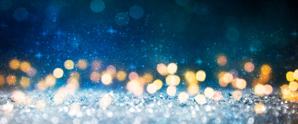 istock Christmas light background.  Holiday glowing backdrop. Defocused Background With Blinking Stars. Blurred Bokeh. 1010766018