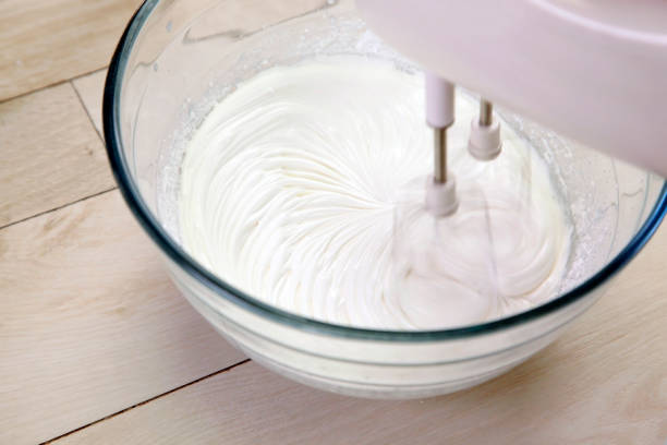 Whipping cream mixer stock photo