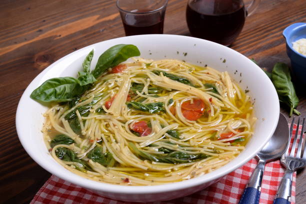 plate of soup with cherry tomatoes and pecorino - basil tomato soup food and drink imagens e fotografias de stock