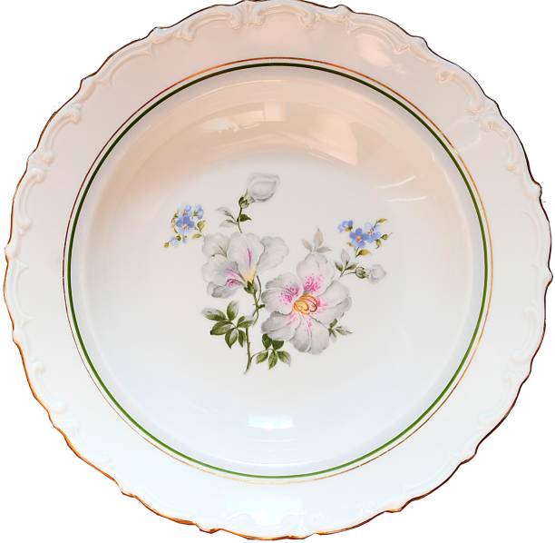 istock Soup plate made in classical style, decorated with relief patterns, flower patterns of violets and forget-me-nots and strips of gold and green 1010777156