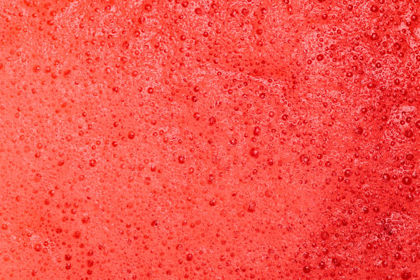 red organic texture of vegetable smoothie stock photo