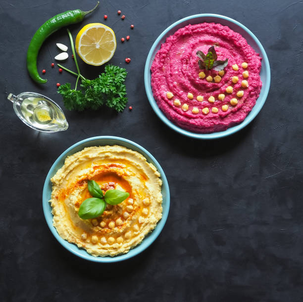 istock Traditional hummus on a plate. The view from the top. 1010786426