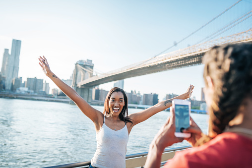 Multi ethnic couple enjoys exploring NYC in summer
