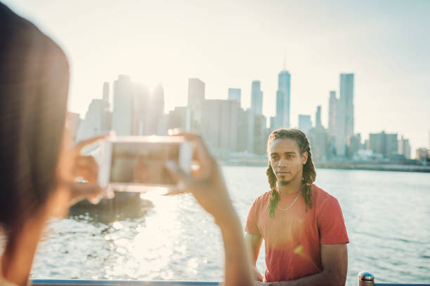 Multi ethnic couple enjoys exploring NYC in summer