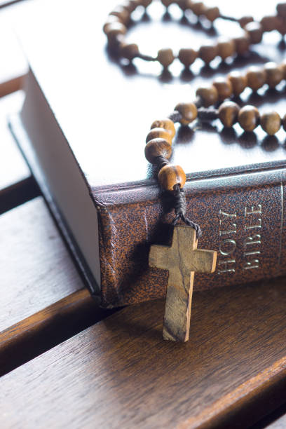 istock Rosary beads and holy bible 1010819816