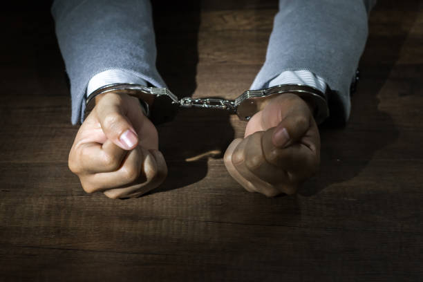istock Businessmen arrested,Businessman with handcuffs 1010820252