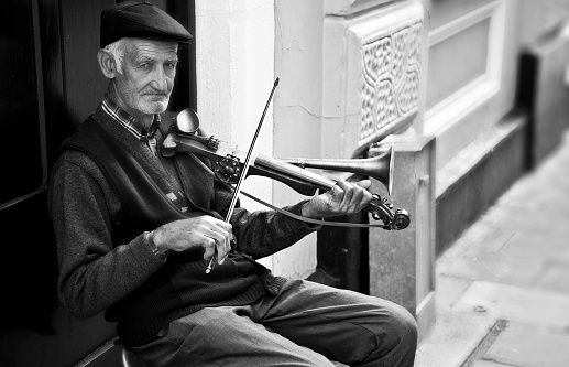 Street musician playing the guitar