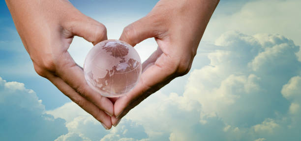 istock hand Heart Earth sky save environment Earth Day 22 April 1010837502