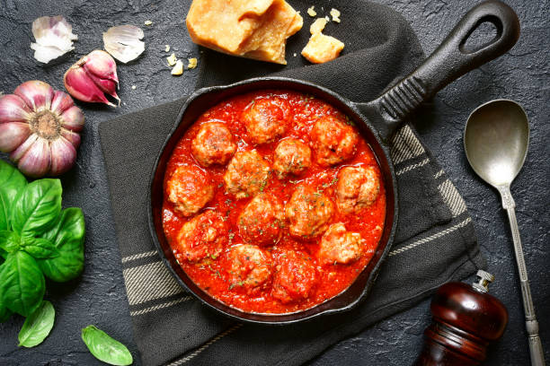 istock Spicy meatballs in tomato sauce in a cast iron pan 1010843754
