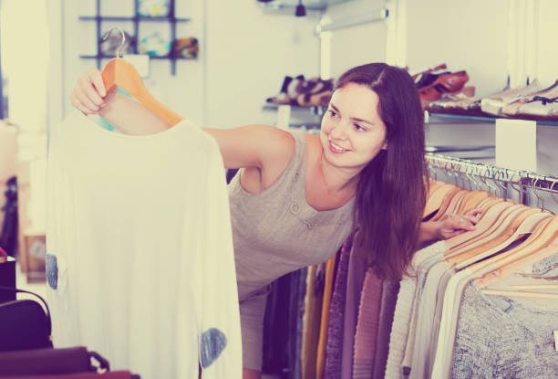 istock Girl in apparel store 1010845884