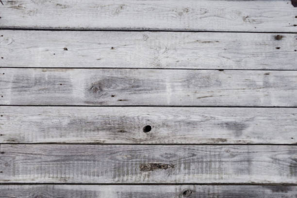 istock Gray unpainted weathered wooden boards 1010846674
