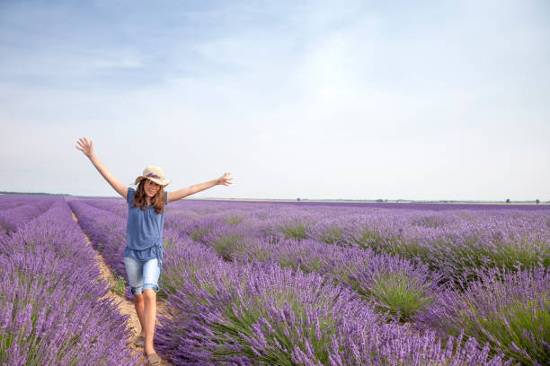 istock Young girl in a lavender field, Provence 1010850440