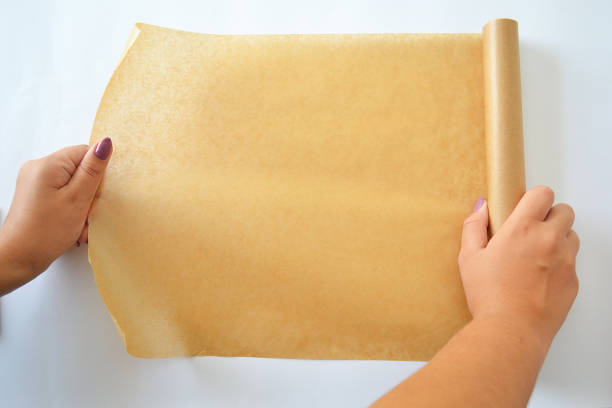 parchment paper for the kitchen. - papel de pão imagens e fotografias de stock