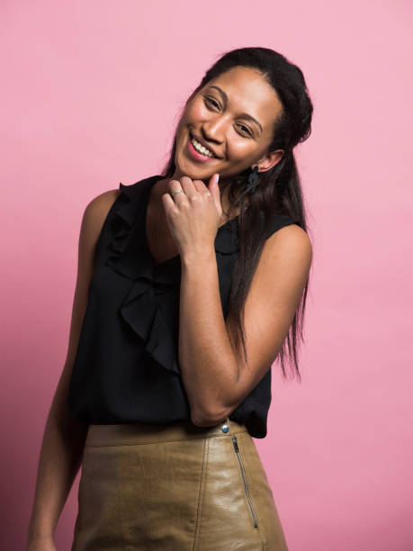 istock Smiling ethnic female touching chin 1010875366
