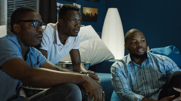 istock Black men watching sports 1010884230