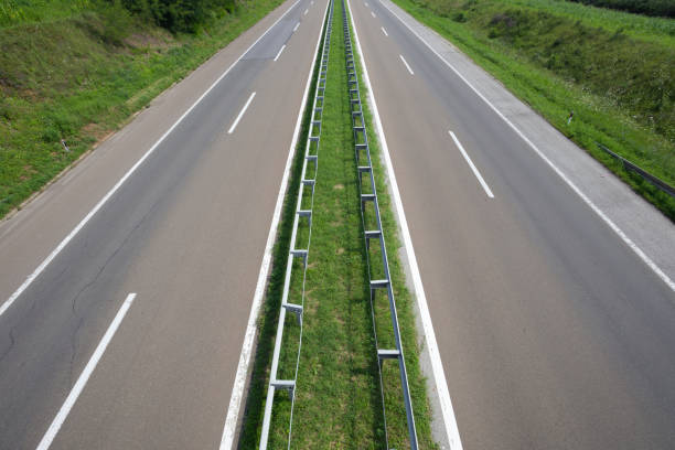 Empty wide highway. High angle view. Photo is taken with full frame dslr camera outdoors on sunny summer day. parallel photos stock pictures, royalty-free photos & images