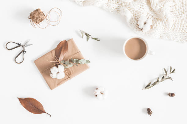 istock Coffee, gift, autumn leaves, knitted blanket. Flat lay, top view 1010897026