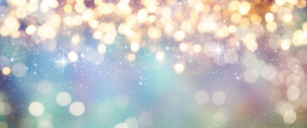 istock Christmas light background.  Holiday glowing backdrop. Defocused Background With Blinking Stars. Blurred Bokeh. 1010898408
