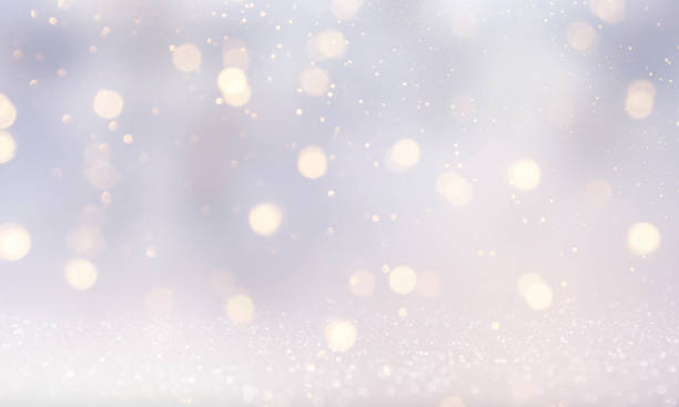 istock Holiday light background.  Christmas and New Year holidays glowing backdrop. Defocused Background With Blinking Stars. Blurred Bokeh. 1010903154
