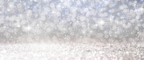istock Christmas light background.  Holiday glowing backdrop. Defocused Background With Blinking Stars. Blurred Bokeh. 1010905800