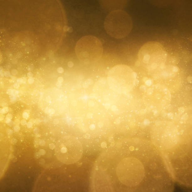 istock Christmas light background.  Holiday glowing backdrop. Defocused Background With Blinking Stars. Blurred Bokeh. 1010906718