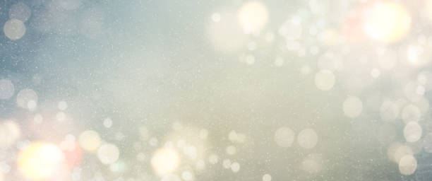 istock Christmas light background.  Holiday glowing backdrop. Defocused Background With Blinking Stars. Blurred Bokeh. 1010906758