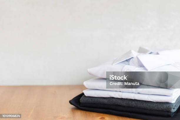 School Uniform Such As White Shirts Sweater And Trousers Stock Photo - Download Image Now