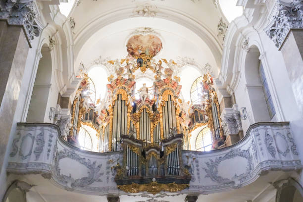 Organ in St Mang Basilica in Fussen, Bavaria, Germany 18th Century Main Organ in Saint Mang Basilica in Fussen, Bavaria, Germany, by Andreas Jager. st mang stock pictures, royalty-free photos & images