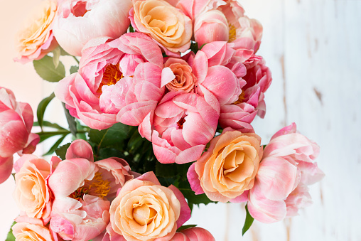 Fresh bunch of pink peonies and roses. Card Concept, pastel colors, close up image