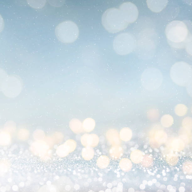 istock Christmas light background.  Holiday glowing backdrop. Defocused Background With Blinking Stars. Blurred Bokeh. 1010910728