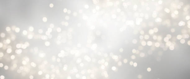 istock Christmas light background.  Holiday glowing backdrop. Defocused Background With Blinking Stars. Blurred Bokeh. 1010910848