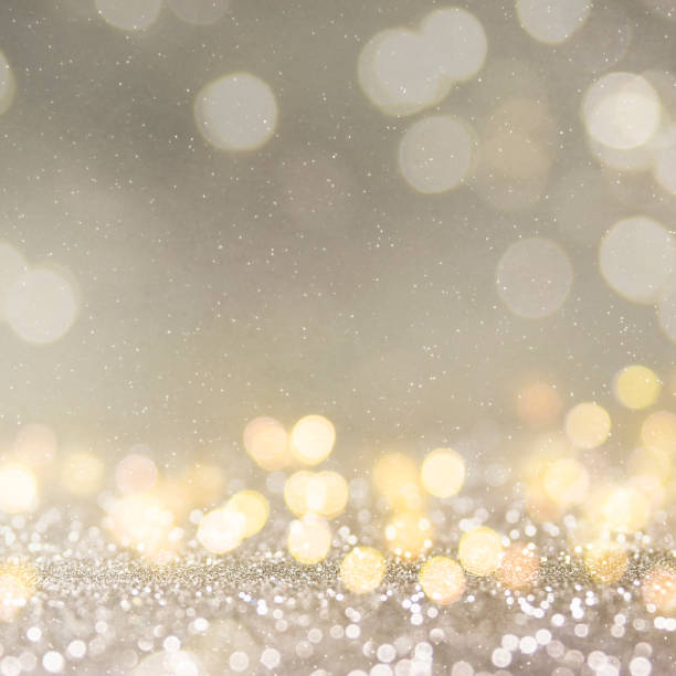 istock Christmas light background.  Holiday glowing backdrop. Defocused Background With Blinking Stars. Blurred Bokeh. 1010910886