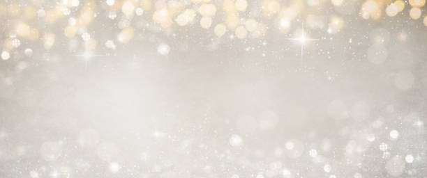 istock Christmas light background.  Holiday glowing backdrop. Defocused Background With Blinking Stars. Blurred Bokeh. 1010911488