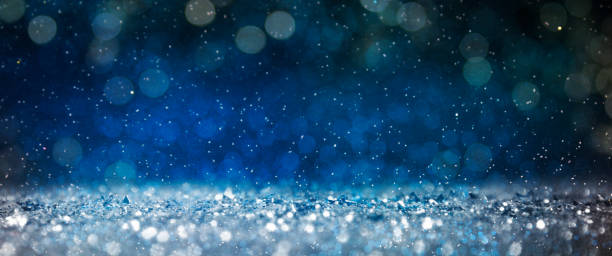 istock Christmas light background.  Holiday glowing backdrop. Defocused Background With Blinking Stars. Blurred Bokeh. 1010911572