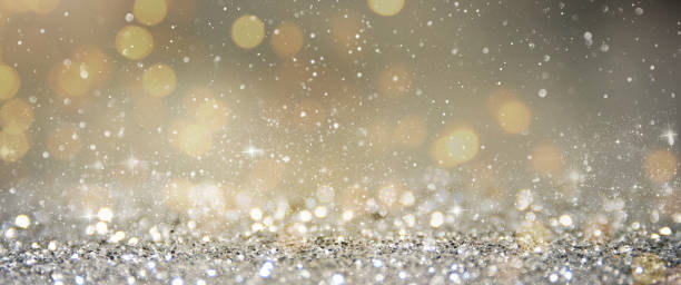 istock Christmas light background.  Holiday glowing backdrop. Defocused Background With Blinking Stars. Blurred Bokeh. 1010914322