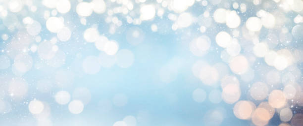 istock Christmas light background.  Holiday glowing backdrop. Defocused Background With Blinking Stars. Blurred Bokeh. 1010915142