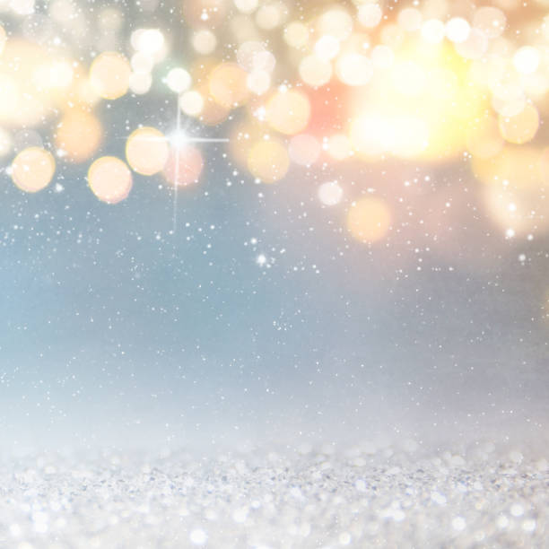 istock Christmas light background.  Holiday glowing backdrop. Defocused Background With Blinking Stars. Blurred Bokeh. 1010915330