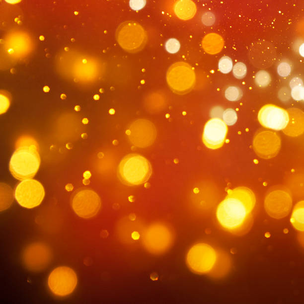 istock Christmas light background.  Holiday glowing backdrop. Defocused Background With Blinking Stars. Blurred Bokeh. 1010919684