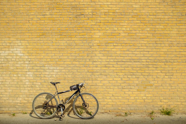istock City Bicycle against the brick wall 1010941610
