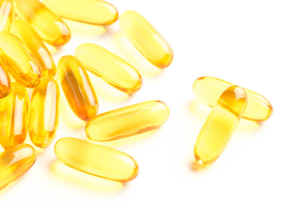 istock fish oil capsules isolated on white background 1010972362