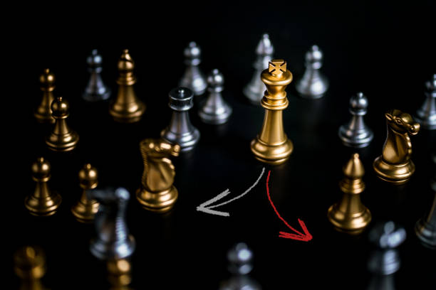 istock business game competitive strategy with chess board game on black table 1010980462