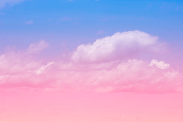 istock Sweet pastel colored cloud and sky with sun light, soft cloudy with gradient pastel color background. 1010984368