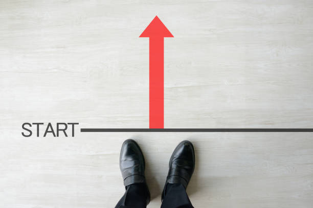 istock Business man standing of start line 1010986988