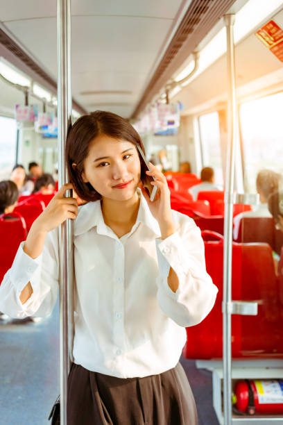 istock Business woman taking the subway to work 1011003596