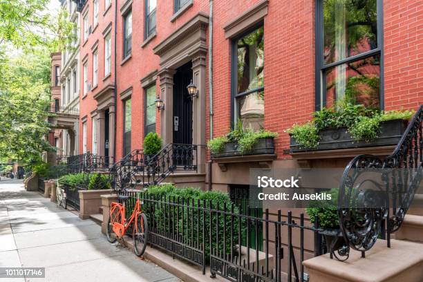 Two Bicycles In Front Of A Brownstone Building In Neighborhood Of Brooklyn Heights New York Stock Photo - Download Image Now