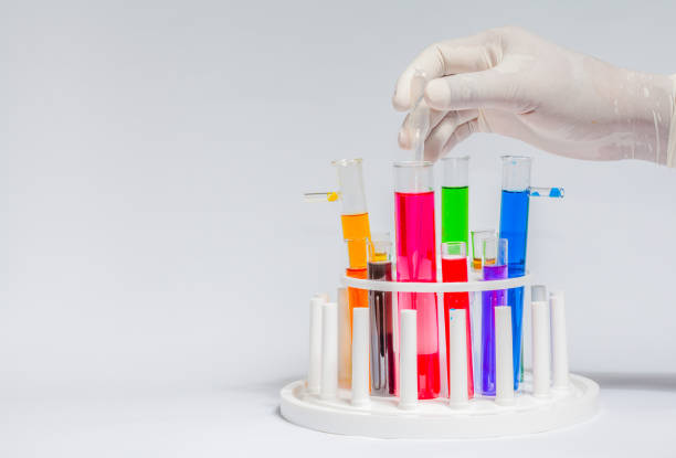 istock Experiment with chemicals in glass tubes.