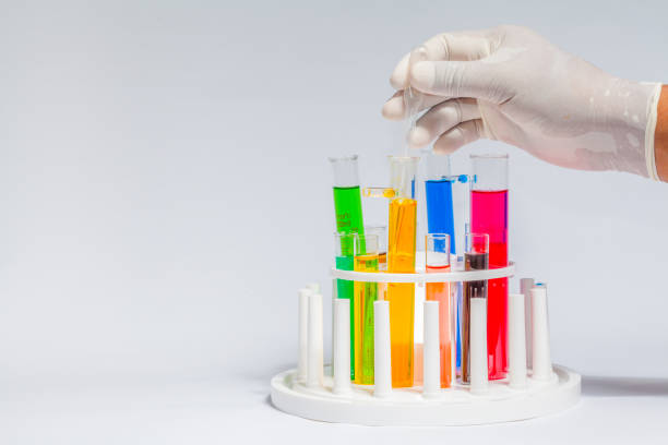 istock Experiment with chemicals in glass tubes.