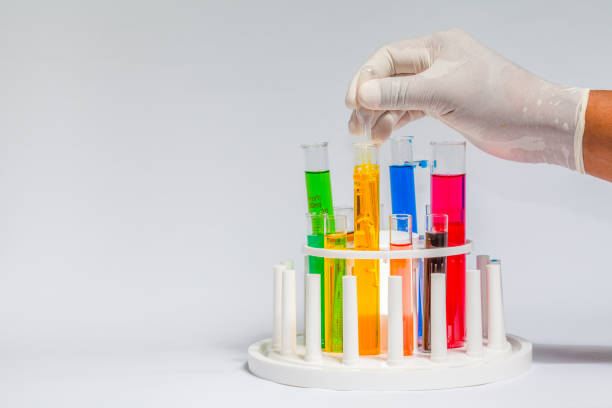 istock Experiment with chemicals in glass tubes.