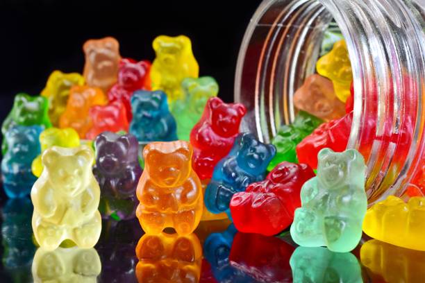 Gummy bears Gummy bears on the black background gummi bears stock pictures, royalty-free photos & images