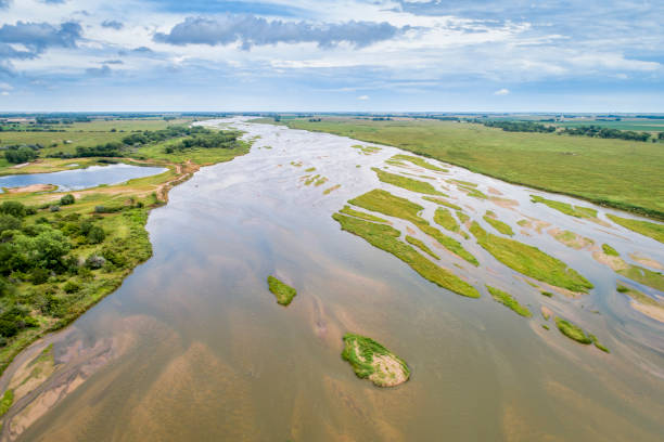 Platte River in Nebraska - aerial view aerial view of shallow and braided Platte River near Kearney, Nebraska in summer scenery kearney nebraska stock pictures, royalty-free photos & images